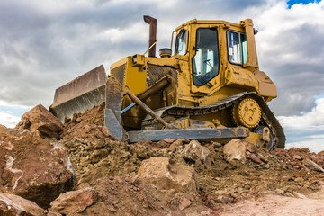 Moving rock and sand in a construction site