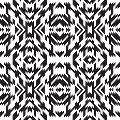 Fototapeta na wymiar Ethnic pattern ikat design. Tribal ornament plaid. Navajo background. Textile geo print. Abstract triangles seamless swatch. Black and white.