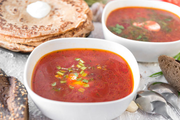 red soup, Ukrainian borsch with greens, pancakes