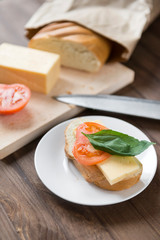 sandwich with cheese, tomato and Basil, bread