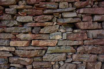 Old multicolored stone wall