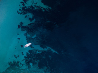 Scenic Sardinia island landscape. Italy sea �??�??coast with azure clear water. Nature background from above - aerial image