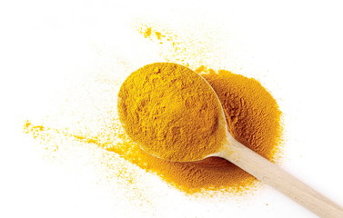 Turmeric (Curcuma) powder with wooden spoon isolated on white background, top view