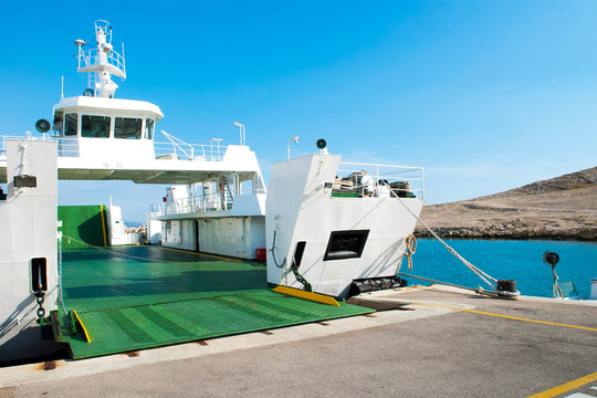 Car Ferry Boat In Croatia Linking The Island Rab To Mainland With Open Ramp, Waiting For Boarding. 