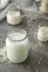 Obraz na płótnie Canvas Jar of healthy rice milk on table