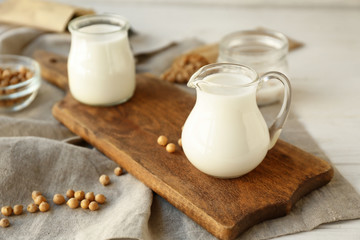 Composition with healthy soy milk on table