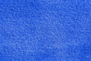 Textures of blue jeans denim fabrics for the background.