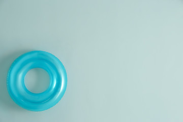 Inflatable ring on color background
