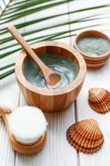 Cosmetic clay on white wooden table