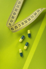 Green and yellow medicine capsule
