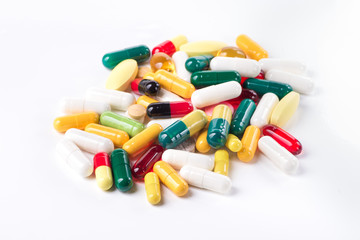 Pile of colored pills isolated