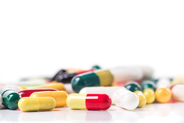 Pile of colored pills isolated