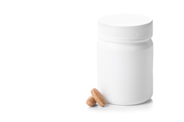 Medicine bottle with pills isolated
