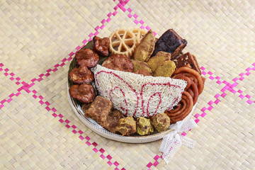 Obraz na płótnie Canvas Kokis, Kewum, Aluwa and Aasmi. Sri Lankan Traditional Sweet Foods on Mat