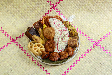 Kokis, Kewum, Aluwa and Aasmi. Sri Lankan Traditional Sweet Foods on Mat