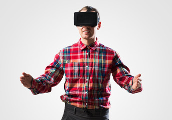 Guy in mask experiencing virtual reality as new entertainment device