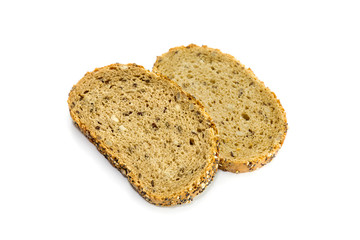 Two slices rye bread on a white background