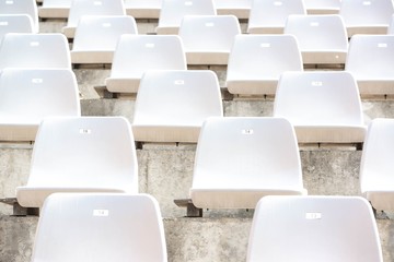 Obraz premium Empty white stadium stand rows with sunlight