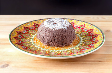 Puttu breakfast made of rice flour and coconut. South India, Kerala. Selective focus. Copy space.
