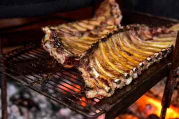 Pig ribbs barbecue , Patagonia, Argentina