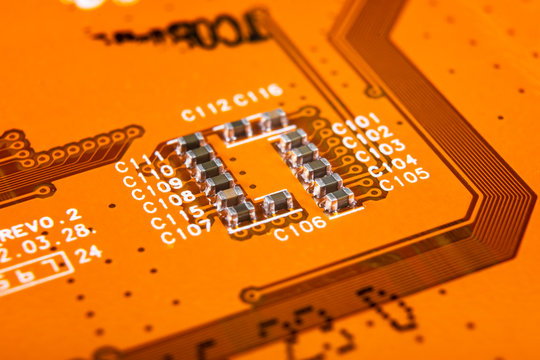 Macro shot of Circuit board with resistors microchips and electronic components. Computer hardware technology. Integrated communication processor. Information engineering. Semiconductor. PCB. Closeup