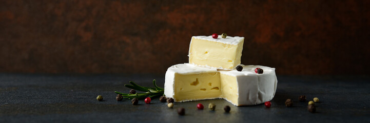 Cheese camembert or brie with fresh rosemary