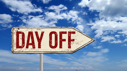 Day off metallic vintage sign over blue sky