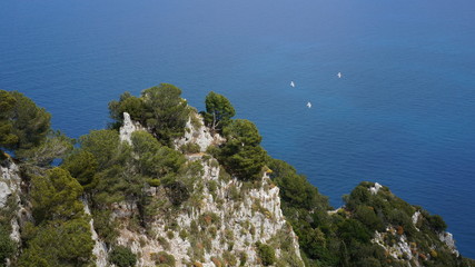View from a cliff on the island of Capri, Italy, and rocks in the sea