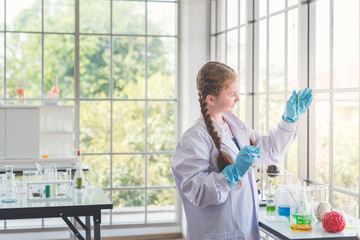 kids with test tubes studying chemistry