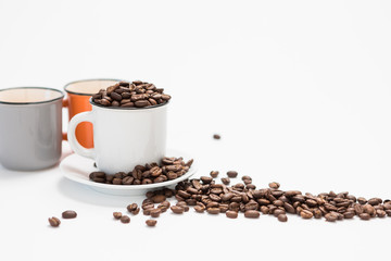 Coffee Cups Filled with Coffee Beans on a White Background Concept with Copy Space