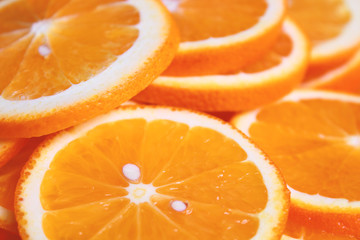 Fresh sliced oranges. Close-up. Background. Texture.