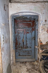 old aged door in an abandoned house