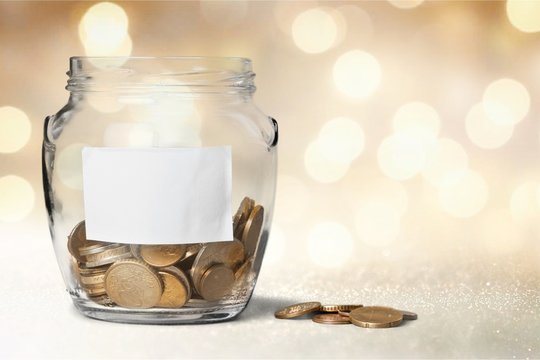 Money Jar with  coins on white background