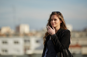 Woman smoking outdoor