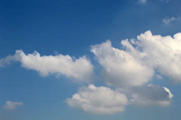 Naklejka na ściany i meble white clouds in sky