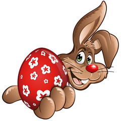 Osterhase mit rotem Ei