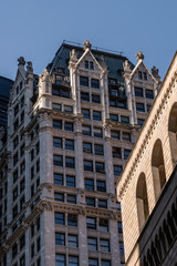 Close-up view of old and modern skyscrapers in Financial District Lower Manhattan New York City