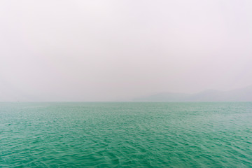 Fototapeta premium Sun moon lake in morning blue sky with fog