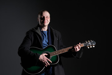Young man with a guitar