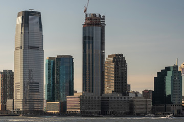 Modern skyscrapers in Jersey City by Hudson river view from Battery Park New York City