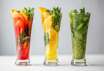 Alcoholic cocktails with fruit. Three kinds. Concept for drinks, summer, heat, alcohol, party and bar