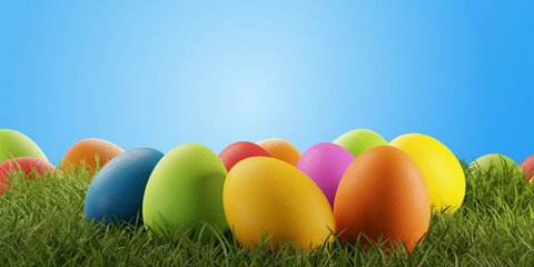 Colorful Easter eggs for Easter in the grass of a meadow 3d-illustration