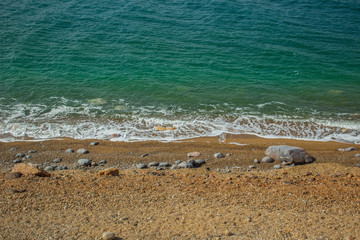 wallpaper pattern simple landscape aerial photography from drone of tropic green and blue sea water surface near waterfront coast line along sand beach without people, summer vacation concept 