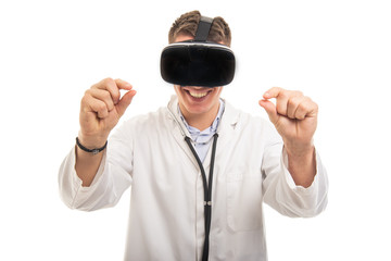 Portrait of young handsome doctor gesturing with vr googles