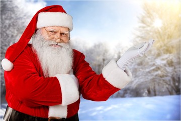 Portrait of santa claus on winter nature background