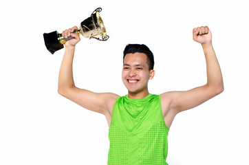 Fototapeta na wymiar Happy expression young fit man in sportswear , holding gold trophy over white background
