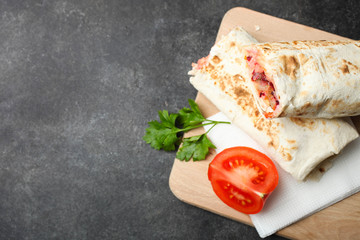 Doner kebab, shawarma in pita and tomato with parsley