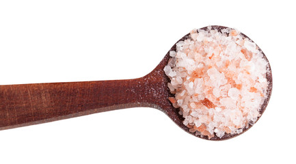 top view of wooden spoon with pink Salt close up
