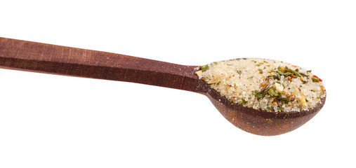 wooden spoon with seasoned salt close up