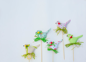 Textile spring birds. Decorative toys of handwork. Easter decorations